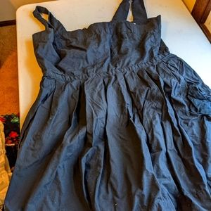 Black Pinafore dress with a broken zipper.